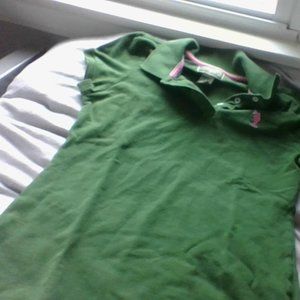 vintage dark green polo with pink collar outlines